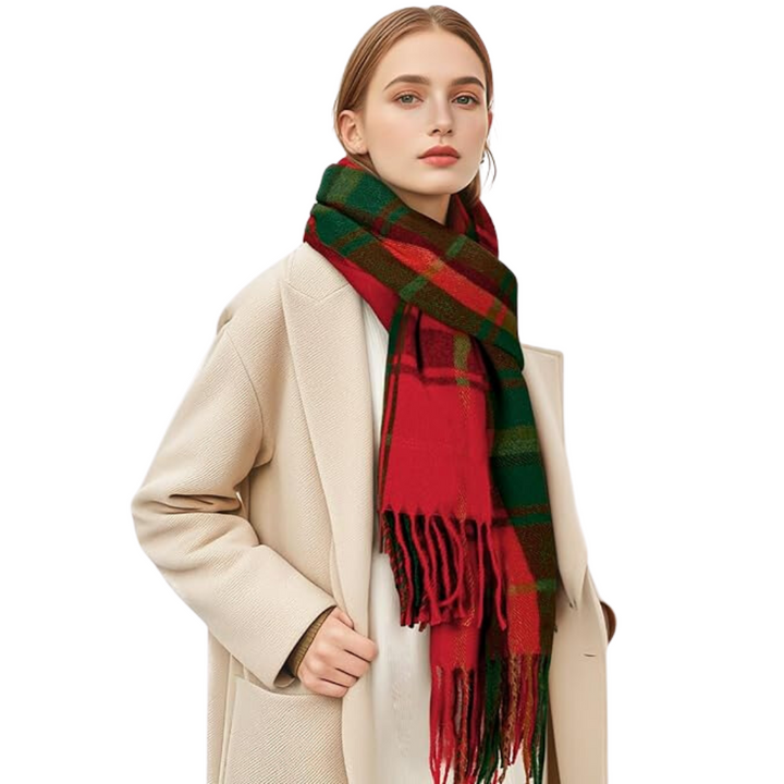 Close-up of a women's soft cashmere blend plaid winter scarf, blue and green tartan, cozy and stylish.