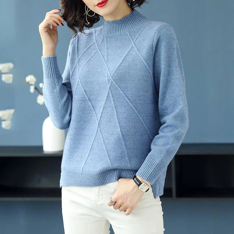 Women's soft diamond pattern turtleneck sweater, elegant and comfortable winterwear.