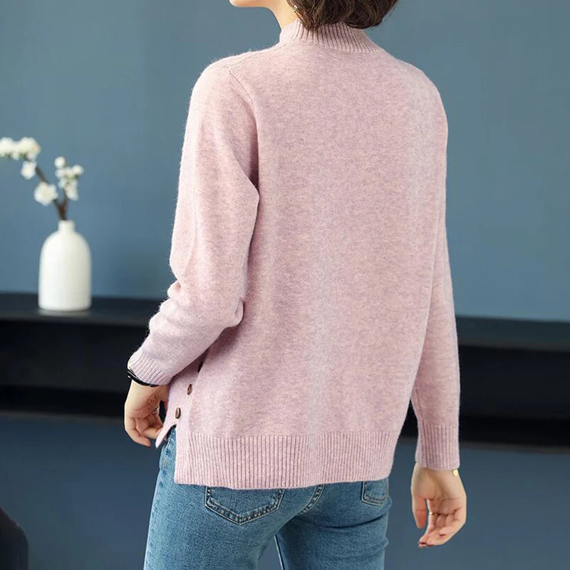 Full length view of women's long-sleeve turtleneck sweater with soft diamond pattern, elegant & warm.