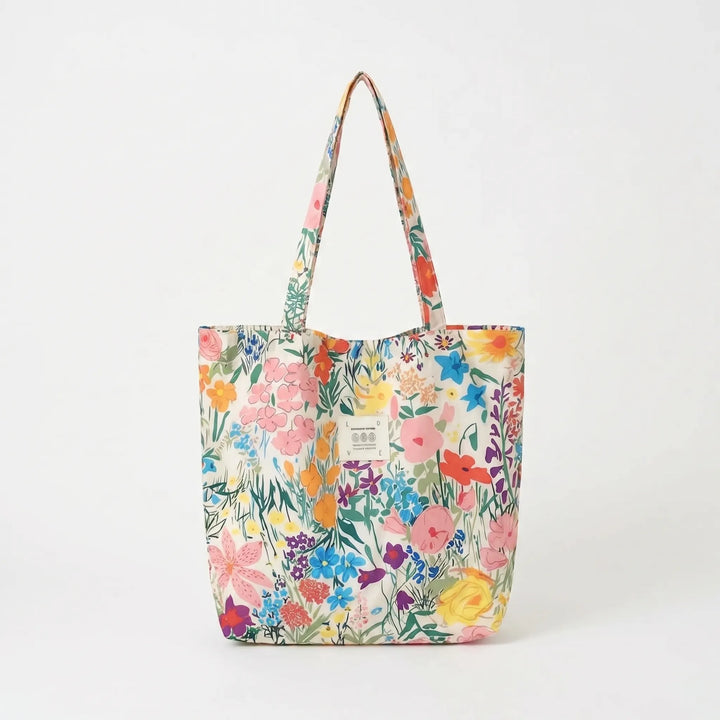 Chic printed soft shoulder tote bag for women, modern floral design for everyday style.