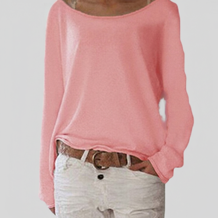 Close-up of a women's cozy polyester blend long sleeve sweater with ribbed cuffs and hem