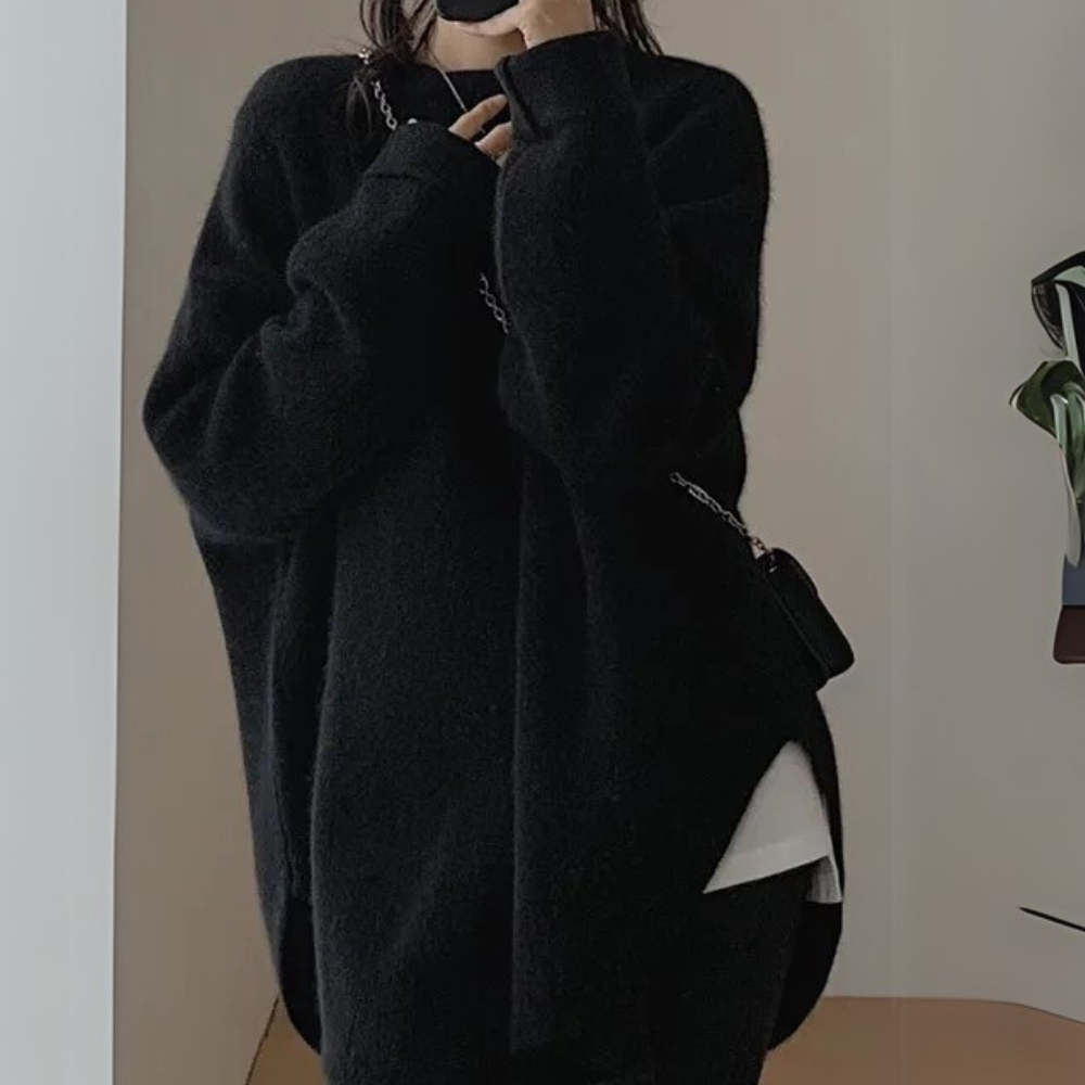 Noor women's comfortable knitted sweater, a stylish and soft pullover for winter fashion.