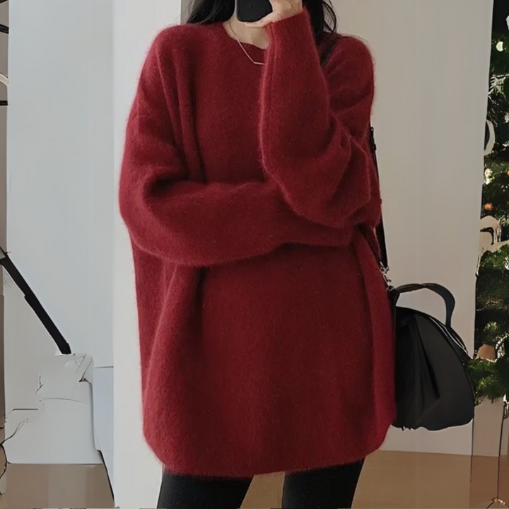 Fashionable women's knitted sweater, offering supreme comfort and soft texture for any occasion.