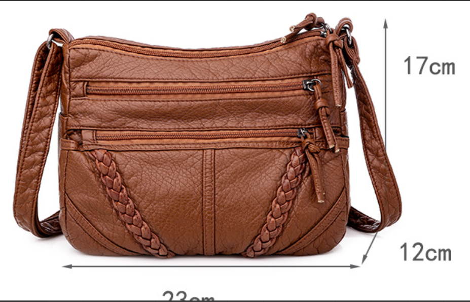 Luxurious women's soft leather shoulder bag in a classic design. A versatile and elegant everyday accessory.