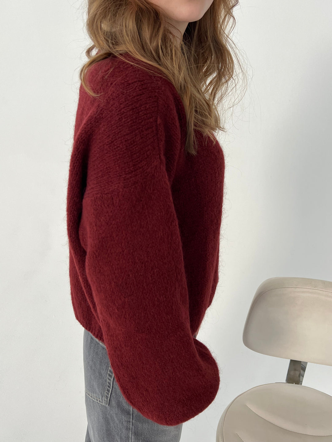 Soft women's round neck loose fit sweater, perfect for cozy and relaxed fashion.