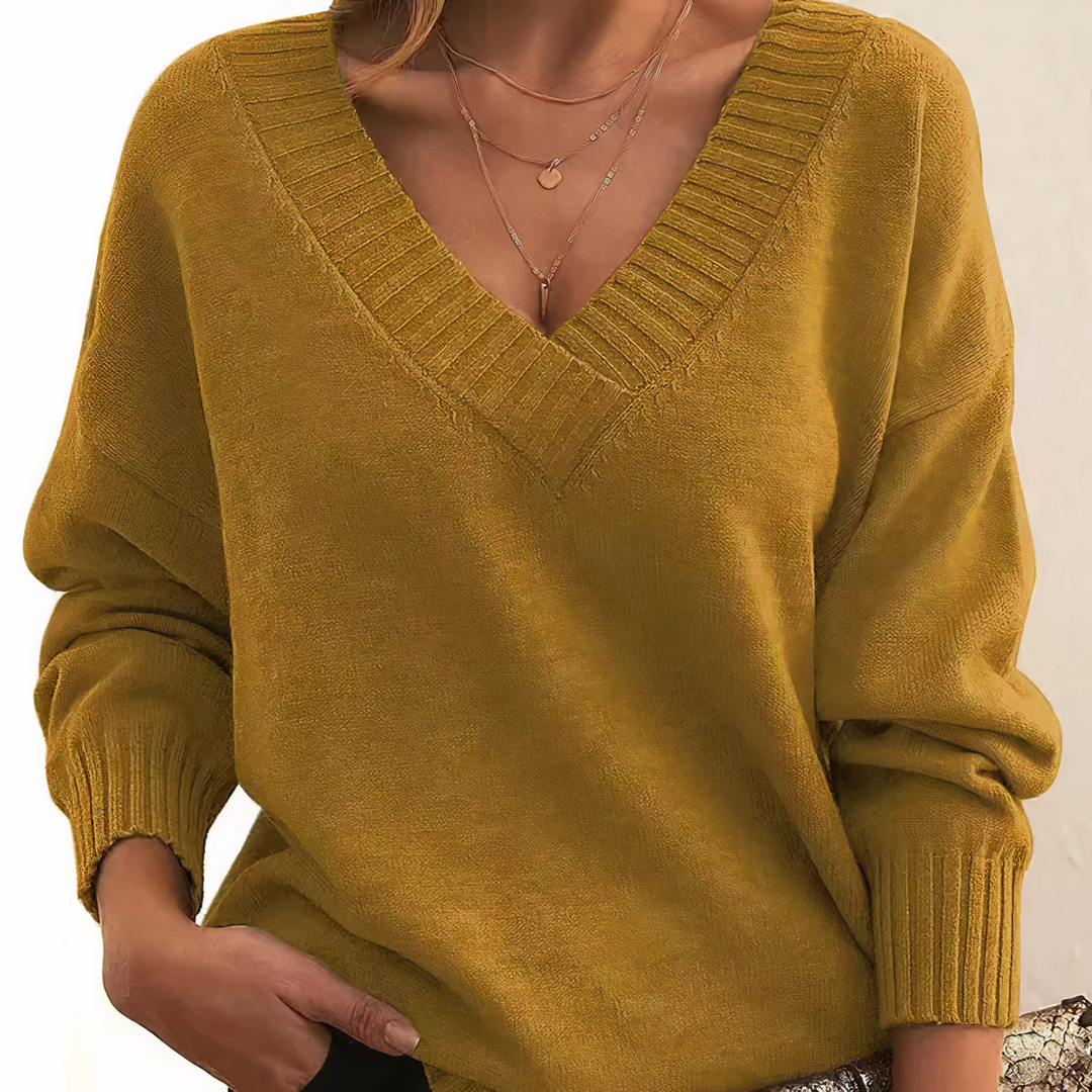 Everyday women's V-neck comfort sweater, a stylish and soft knit top for versatile casual looks.