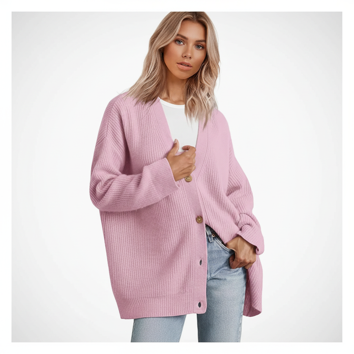 Women's cashmere sweater, emphasizing its soft and warm qualities for cold weather.