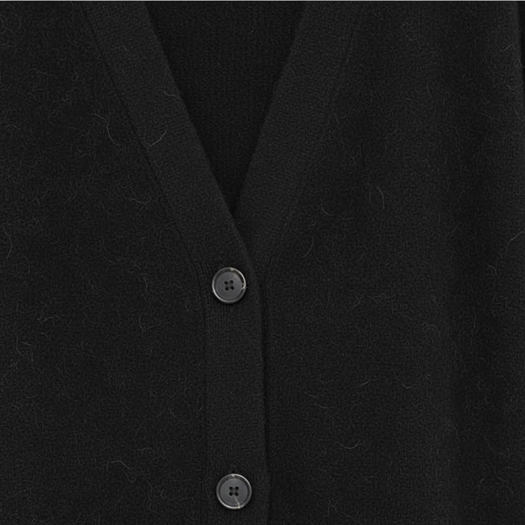 Elegant women's V-neck cashmere sweater, ideal for cozy winter outfits and casual wear.