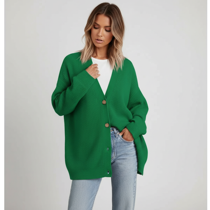 Detail of the V-neckline on a plush women's cashmere sweater, perfect for layering.