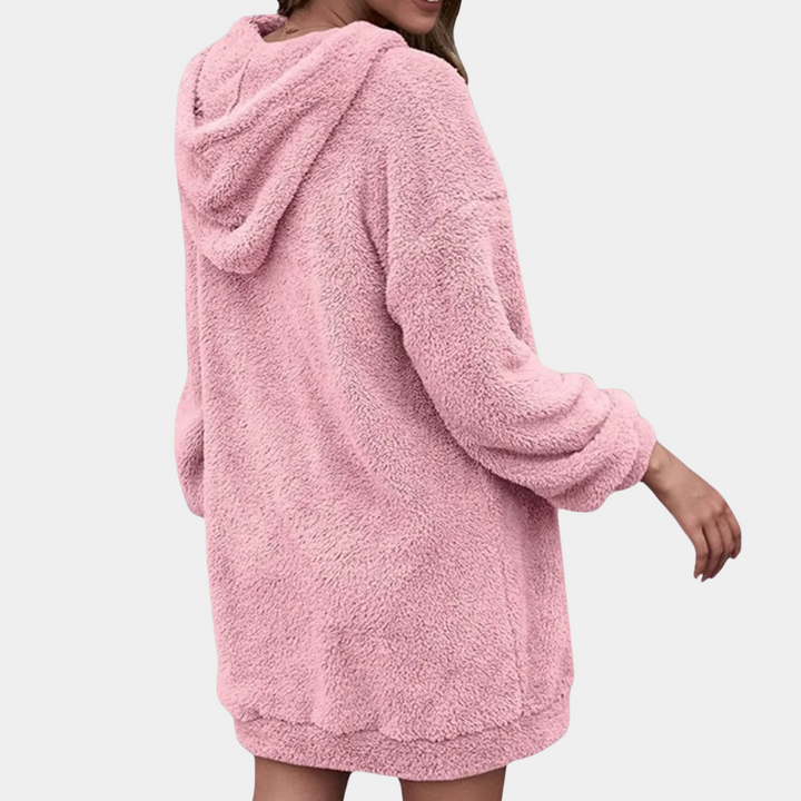 Stylish women's zip-up winter sweater. Soft and warm knit jumper perfect for fall fashion.