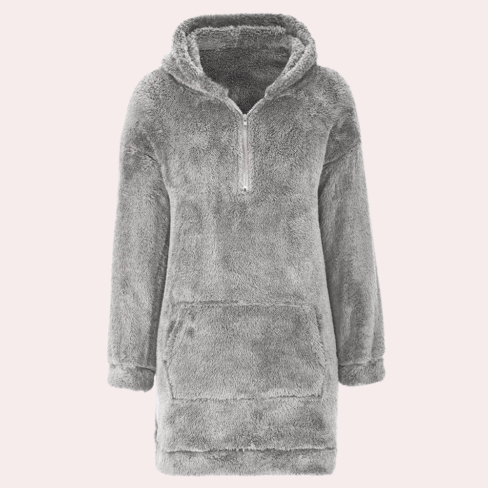 Soft and warm women's winter knit top. Stylish long-sleeve jumper with a convenient zip.