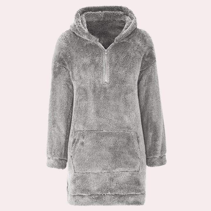 Soft and warm women's winter knit top. Stylish long-sleeve jumper with a convenient zip.