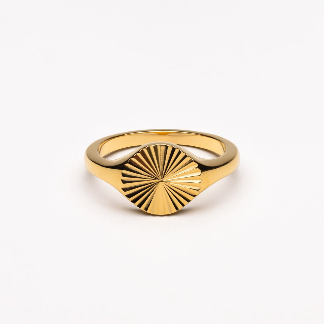 Women's Solara Sun Signet Ring in gold and silver, elegant everyday jewelry.