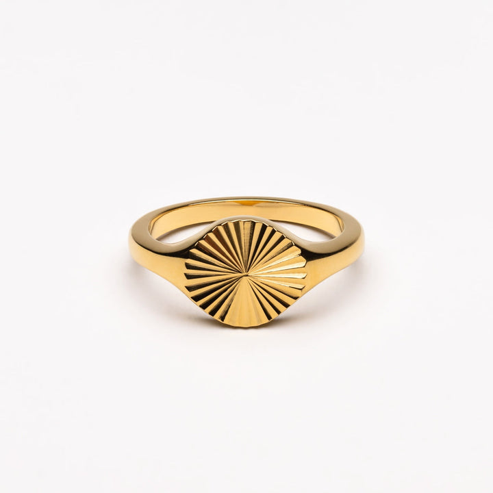 Women's Solara Sun Signet Ring in gold and silver, elegant everyday jewelry.