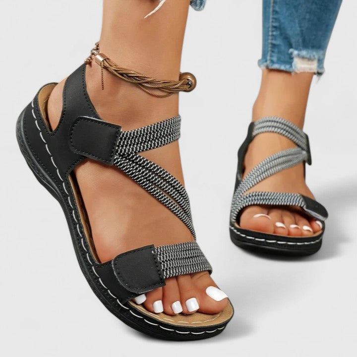 Comfortable women's sandals featuring essential arch support for all-day wear.