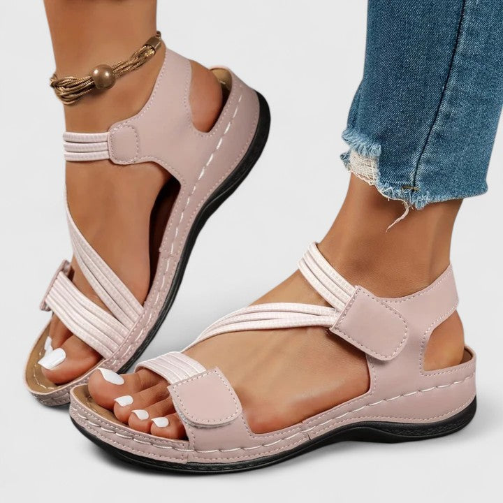 Pain relief women's sandals, designed with orthotic arch support for maximum foot comfort.