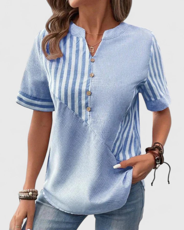 Women's sophisticated striped top in pink, an elegant blouse for work wear, office, or casual fashion.