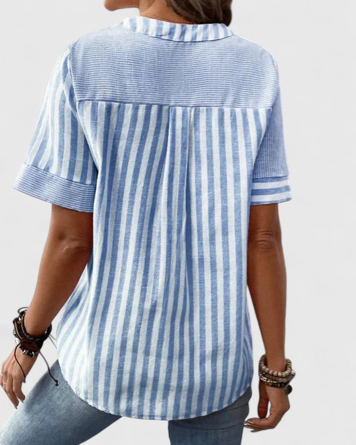 Versatile green striped women's blouse, perfect for a sophisticated look, office style, or casual everyday wear.