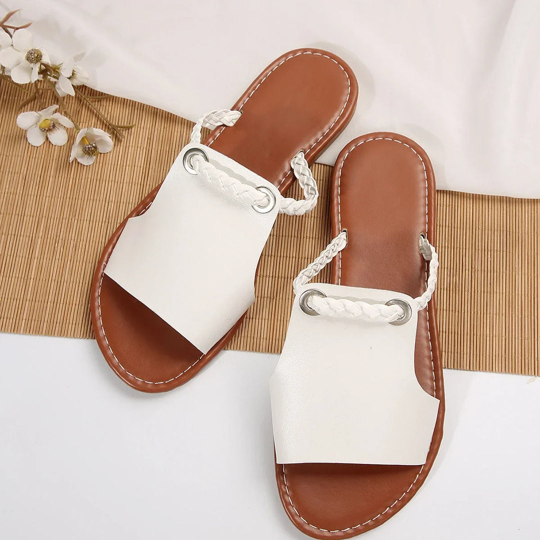 Women's casual braided thong flat sandals for beach walks or comfortable everyday outings.