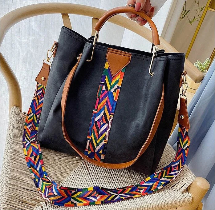 Stylish women's PU leather tote, versatile for work, travel, or daily use. Roomy everyday carry shoulder bag.