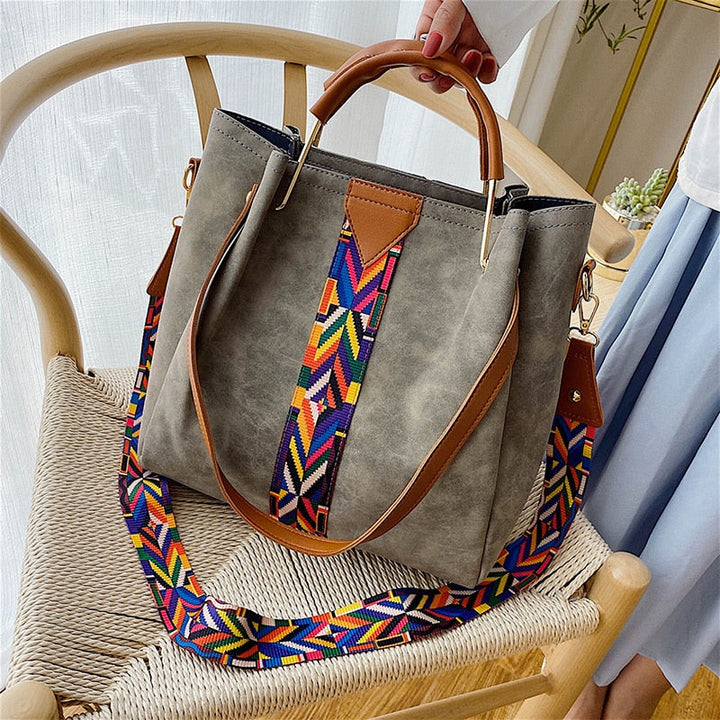 Fashionable women's spacious PU leather tote bag. Durable everyday carry shoulder bag, ideal for busy lifestyles.
