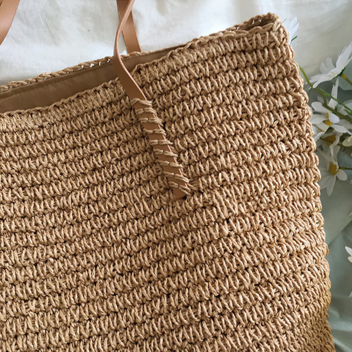 Elegant TerraWoven women's purse with unique woven design and sturdy shoulder strap. A versatile daily carry.