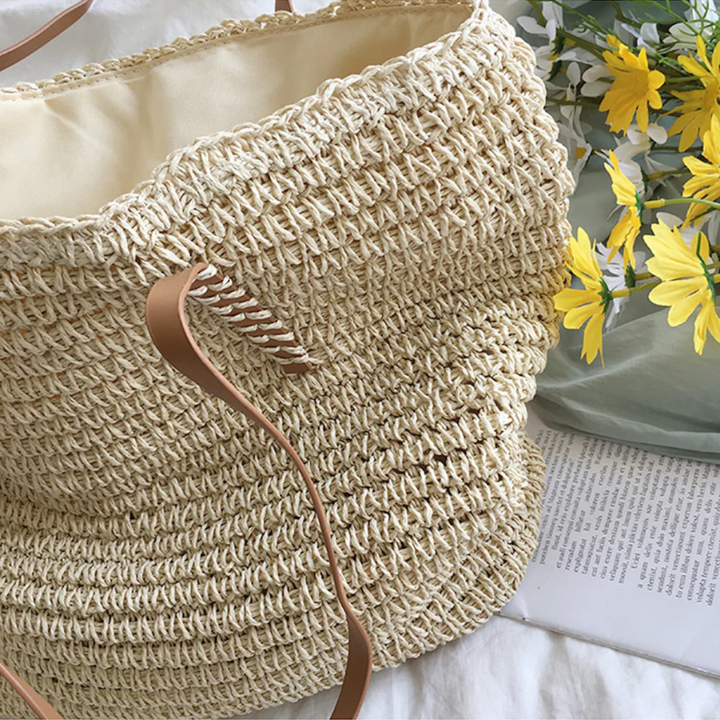 Side view of TerraWoven women's elegant shoulder bag, featuring sturdy construction & unique woven pattern.