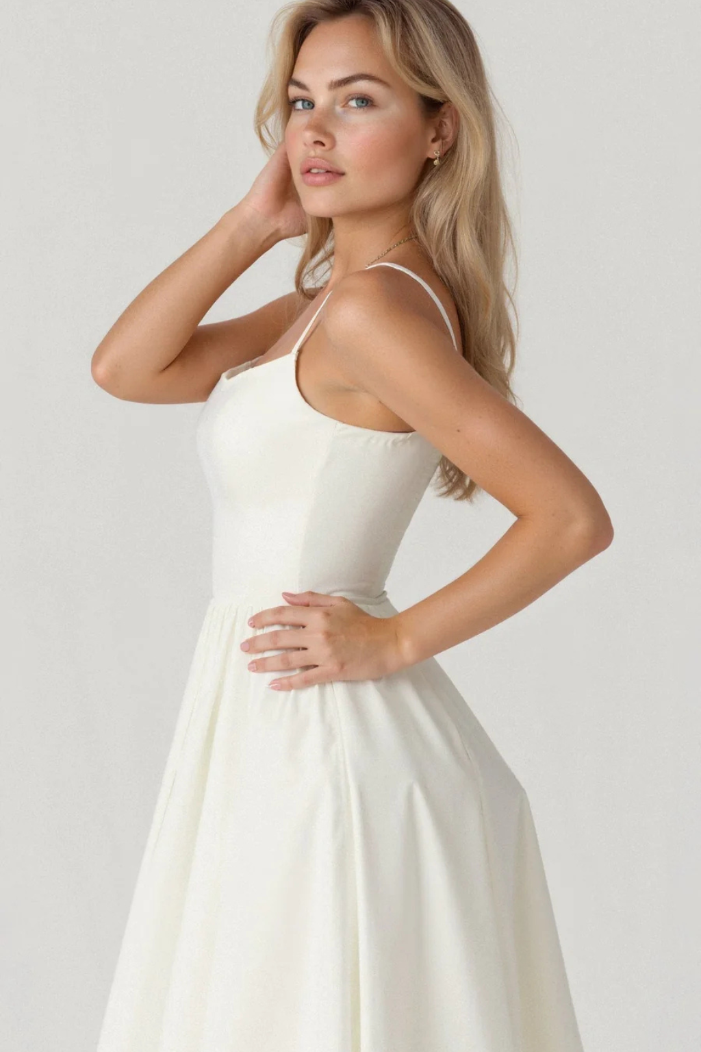 Beautiful flowing women's midi sundress, featuring slender spaghetti straps for effortless charm.