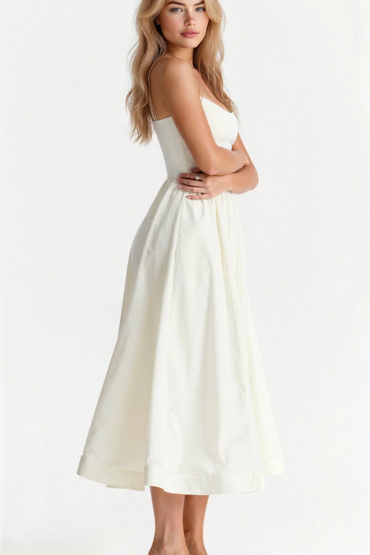 Essential women's spaghetti strap midi dress, a versatile piece for spring & summer wardrobes.