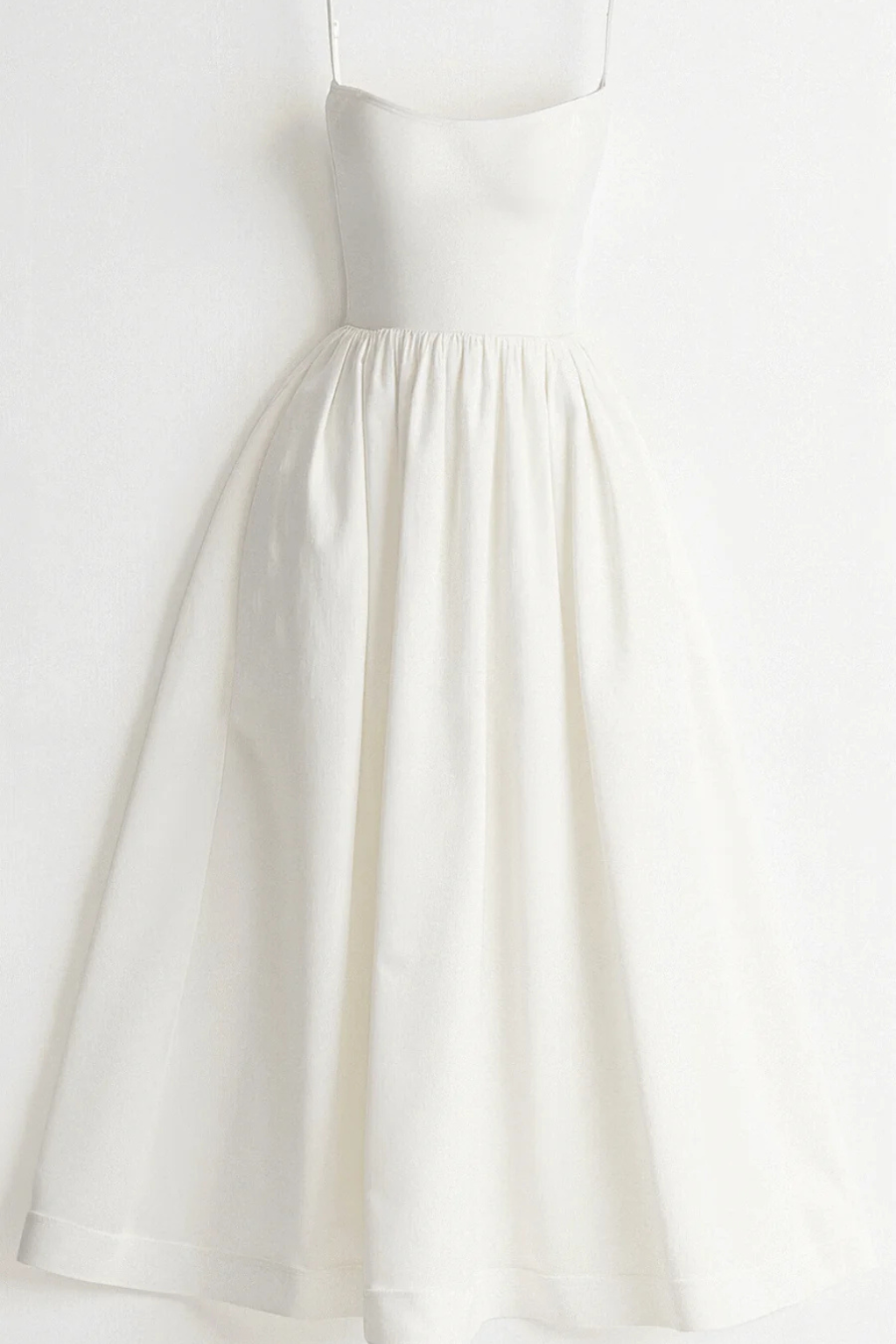 Women's casual midi sundress with spaghetti straps, perfect for spring fashion and summer vacation wear.