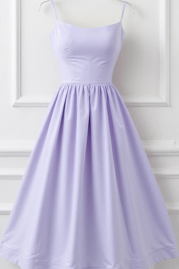 Sleeveless women's midi sundress with spaghetti straps, a must-have for summer fashion.