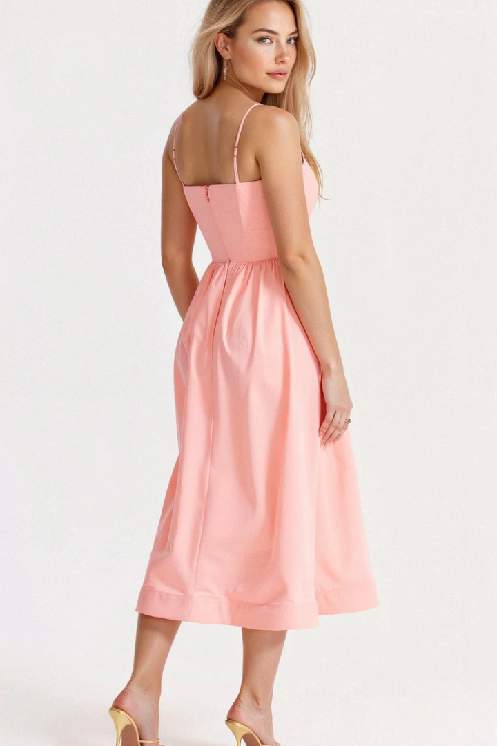 Comfortable women's spaghetti strap midi sundress, providing an effortlessly stylish summer look.