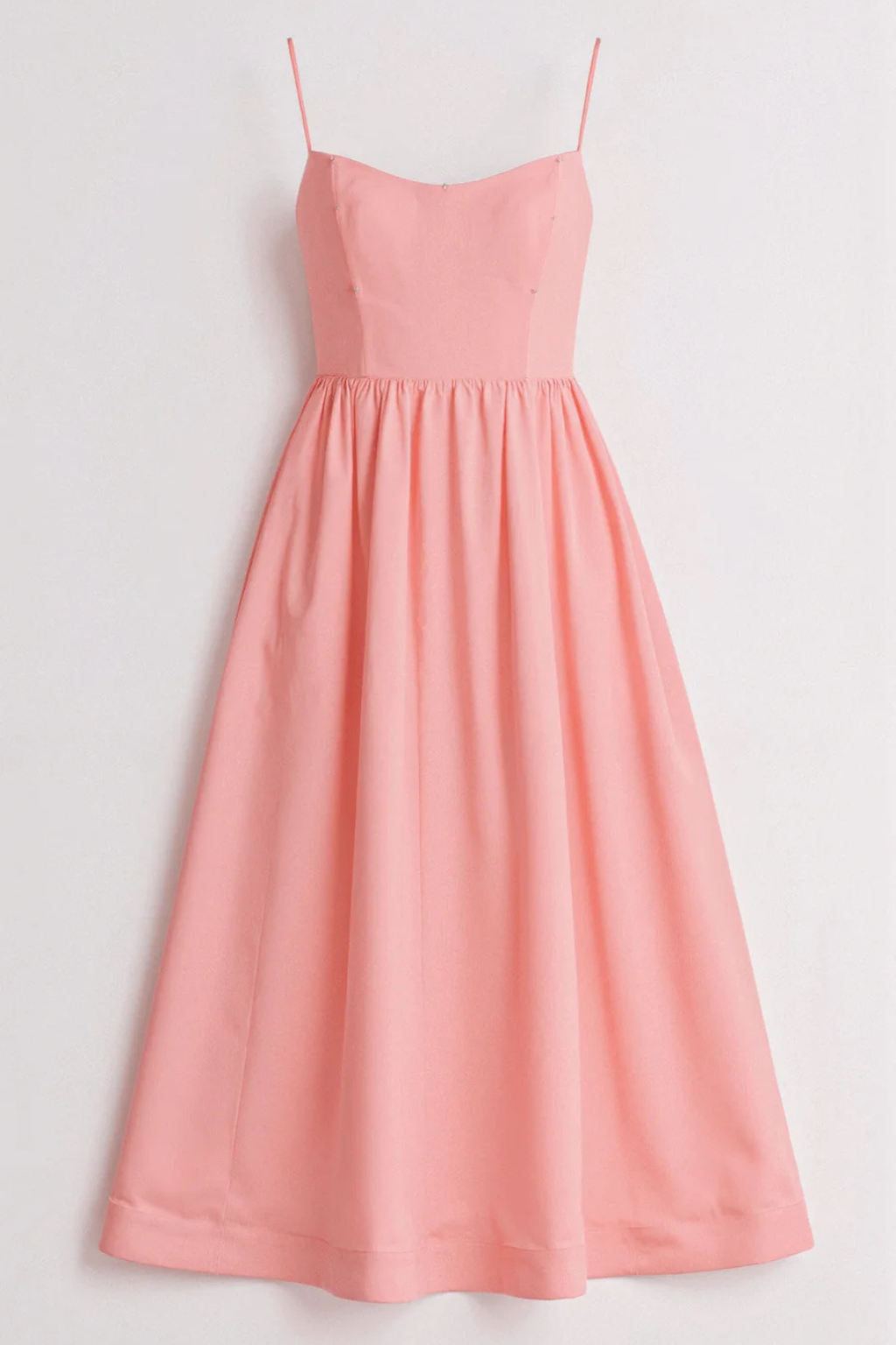 Light & airy women's summer midi dress with spaghetti straps, perfect for warm weather fashion.