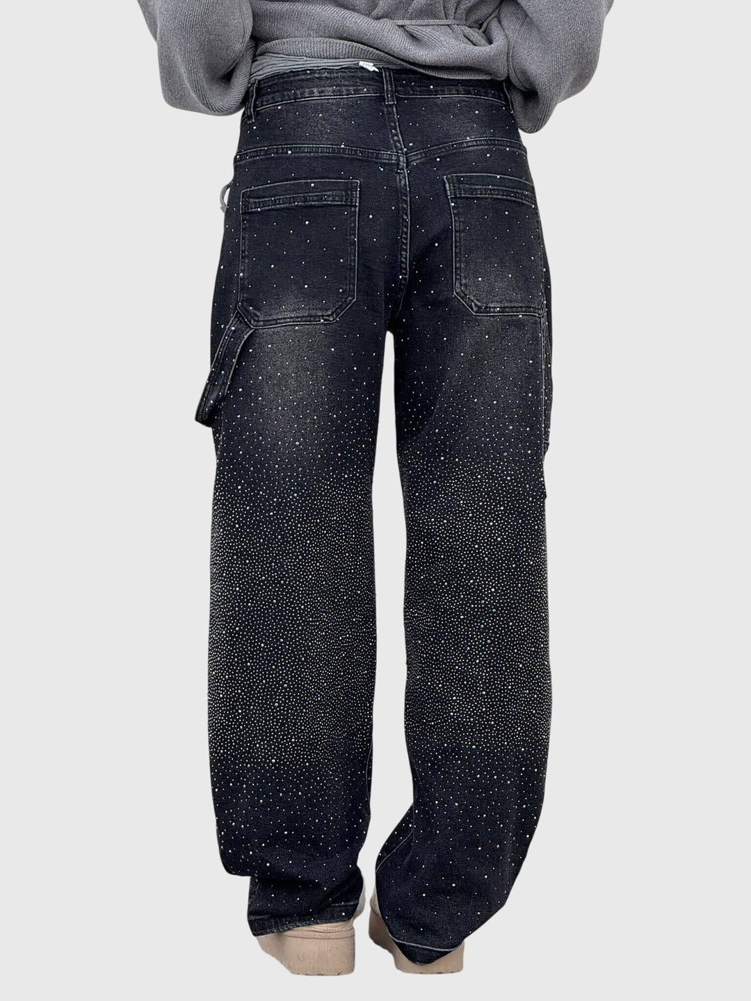 Glamorous women's fashion: loose fit diamond accent pants. Stylish and sparkling for evenings.