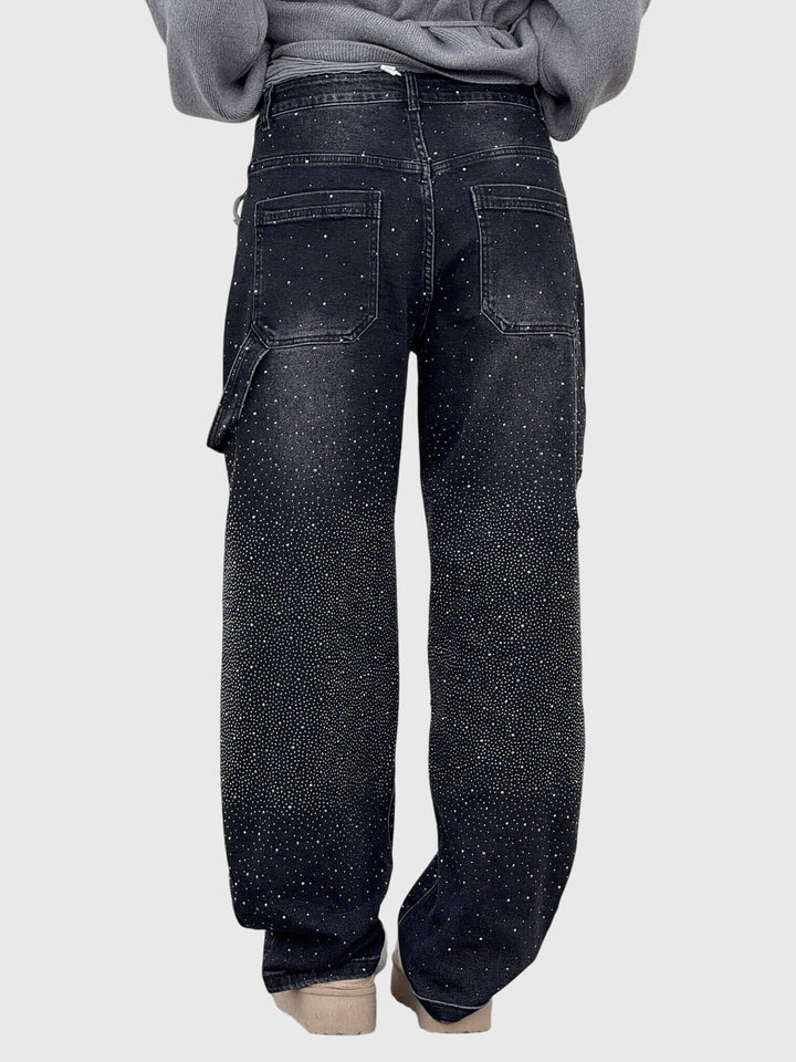 Glamorous women's fashion: loose fit diamond accent pants. Stylish and sparkling for evenings.