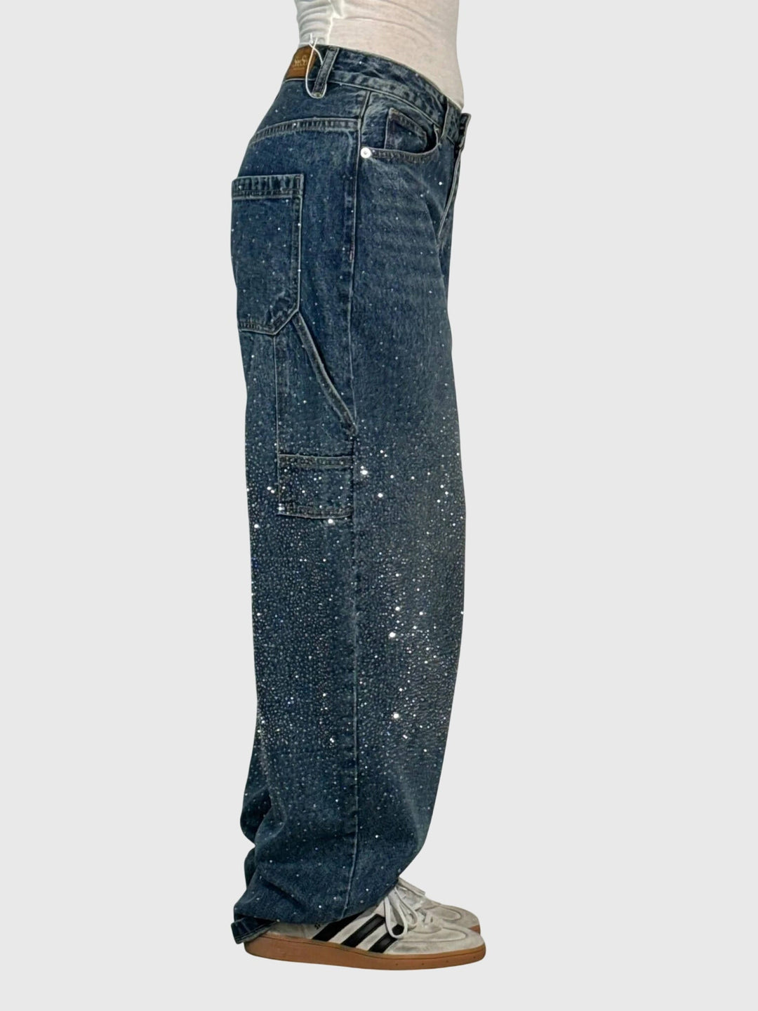 Chic women's diamond pants, featuring sparkling accents. Versatile for casual or dressy wear.