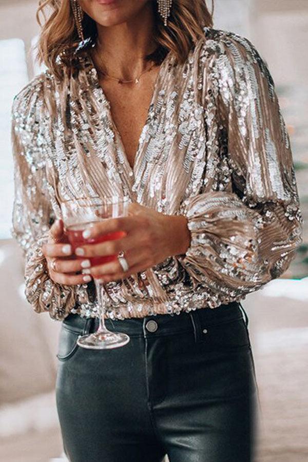 Shiny glitter V-neck long sleeve top for women. Stylish and sparkling, ideal for spring/summer parties & celebrations.