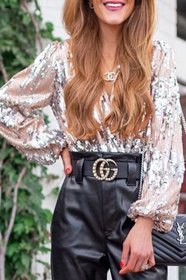 Dazzling women's V-neck long sleeve top with all-over glitter. A chic & festive shirt for evening events & parties.