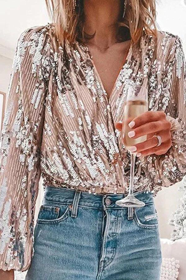 Fashionable women's sparkling glitter V-neck long sleeve top. Ideal for parties, special occasions, and elegant evenings.