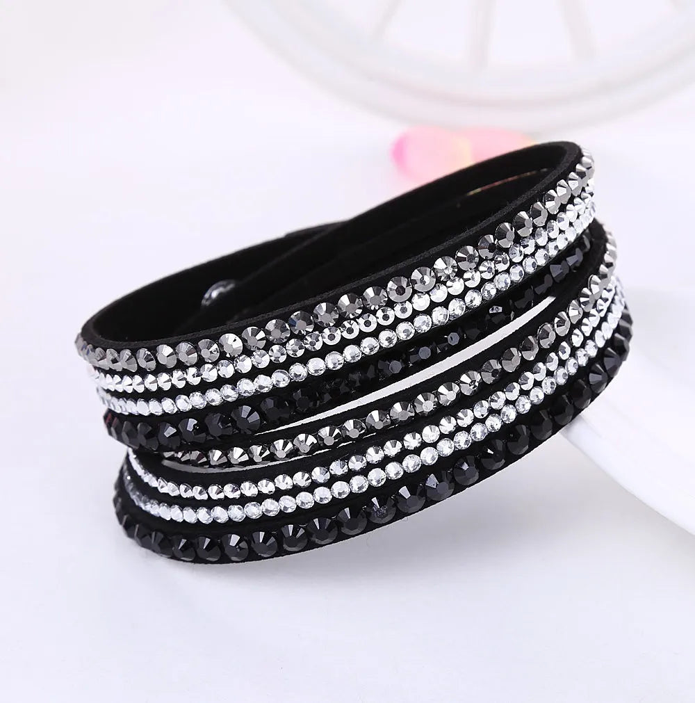 Women's sparkling layered rhinestone wrap bracelet, elegant fashion jewelry accessory.