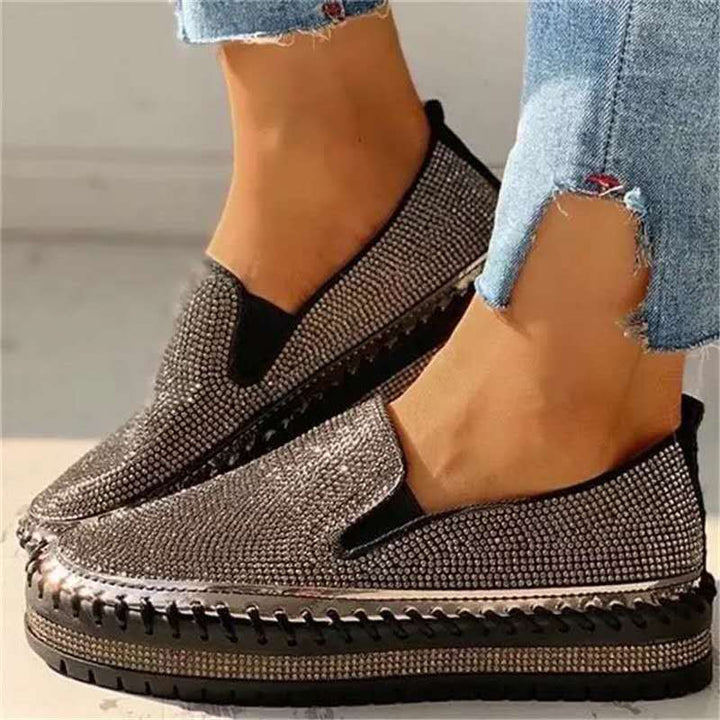 Glamorous women's glitter loafers featuring a comfortable flat sole, a must-have for women's fashion.