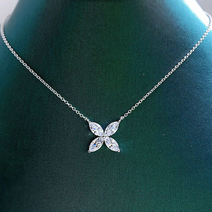 Radiant women's moissanite eye necklace. Brilliant full cut gemstone pendant, a sparkling and elegant fashion accessory.