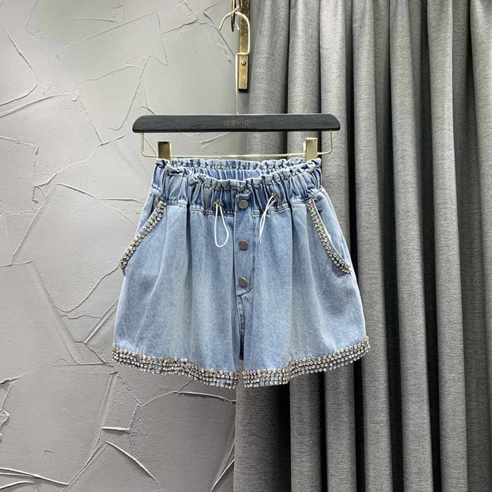 Shimmering rhinestone women's shorts, a trendy and glamorous bottom for any party or fashion event.