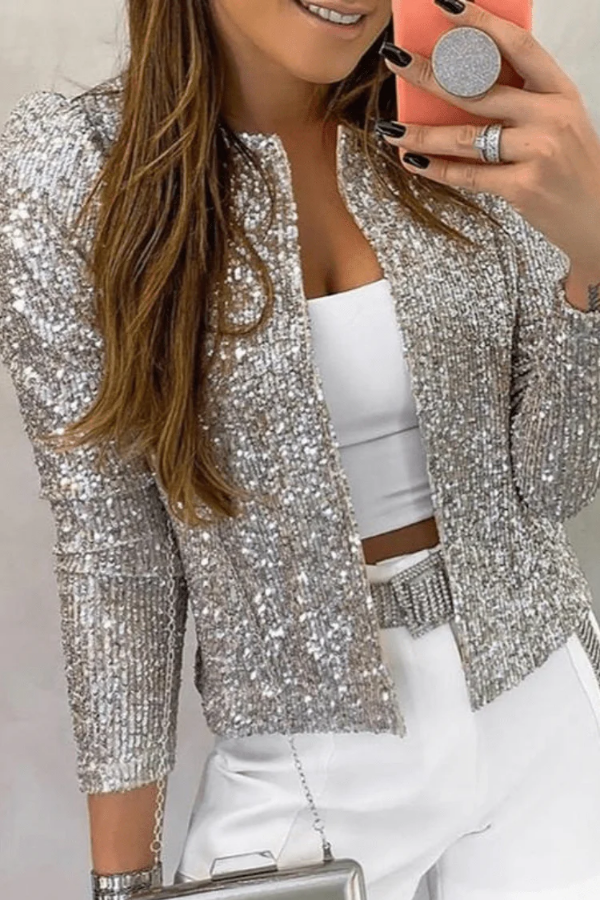 Shiny women's sequin blazer in sparkling design. A dazzling open-front jacket, perfect for celebration attire.