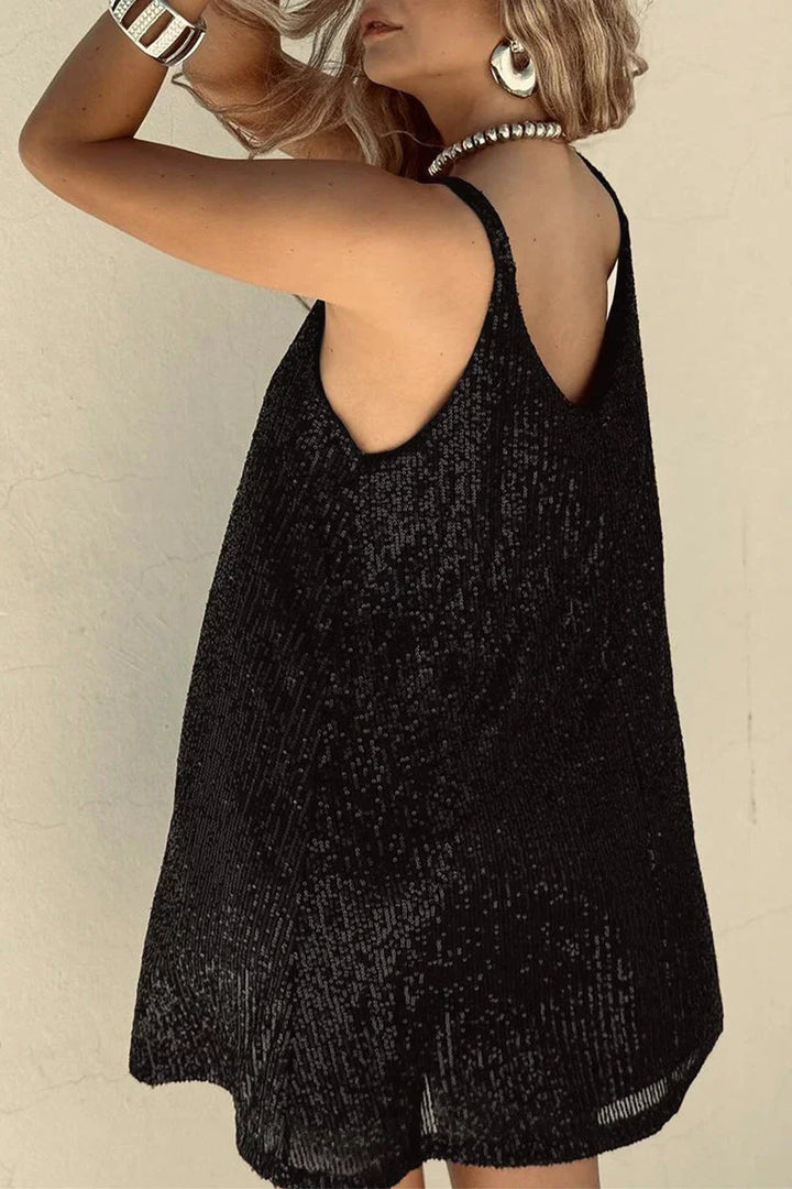 Shimmering sequin mini dress with a V-neck. Sleeveless women's evening & holiday attire.