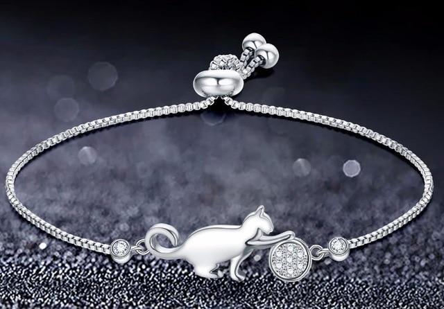 Adjustable women's sparkling cat charm bracelet in silver-tone. Perfect elegant gift for her, an animal lover.