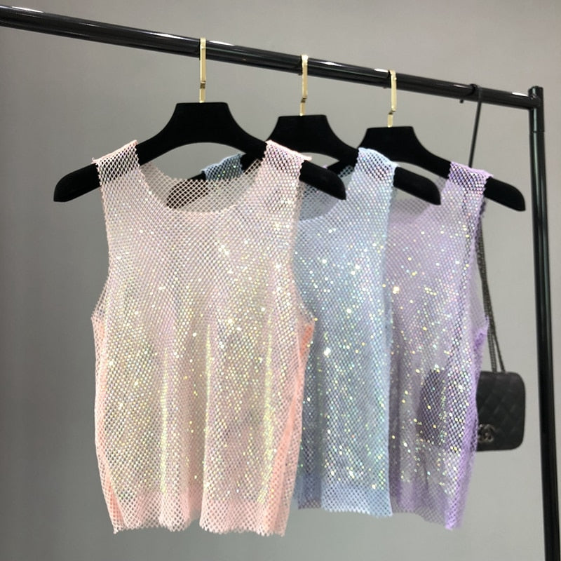 Women's fashion top, a sleeveless sparkling & embellished tank, perfect for glamorous evening wear.