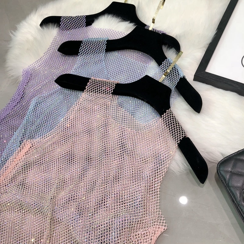 Glamorous women's sparkling sleeveless top, a chic embellished tank for evening wear.