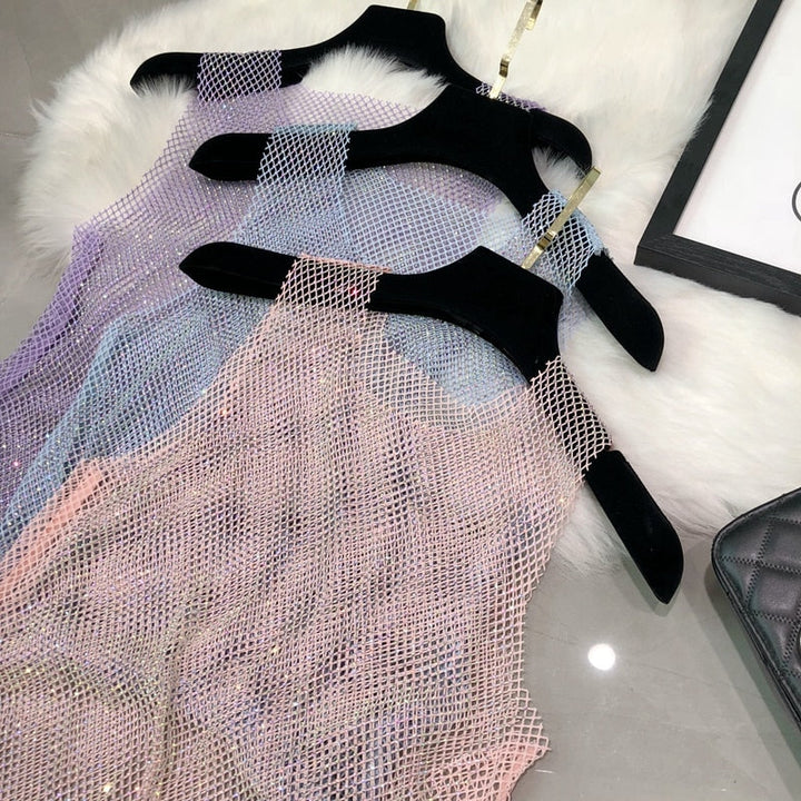 Glamorous women's sparkling sleeveless top, a chic embellished tank for evening wear.