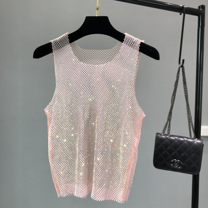 Trendy women's sparkling tank top, an embellished sleeveless top for glamorous going out fashion.